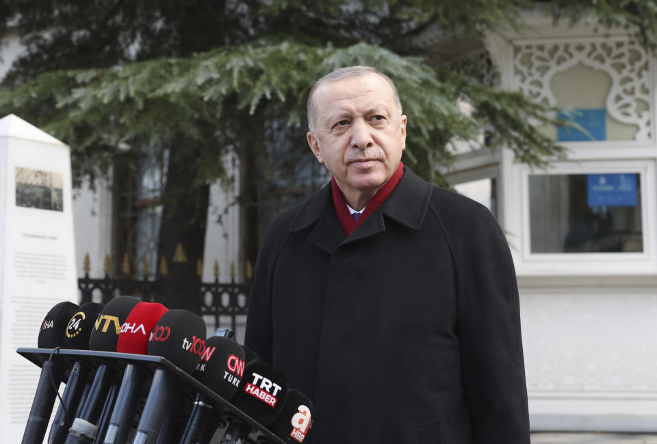 Turkey's President Recep Tayyip Erdogan speaks to the media after Friday prayers, in Istanbul, Friday, Jan. 15, 2021. Turkey’s president has criticized the United States for kicking his country out of the F-35 fighter jet program after Ankara purchased a Russian missile defense system. Speaking after Friday prayers in Istanbul, Turkish President Recep Tayyip Erdogan said Turkey paid “very serious money” for the F-35 stealth jets and that America had committed “a very serious mistake” with its NATO ally. (Turkish Presidency via AP, Pool)