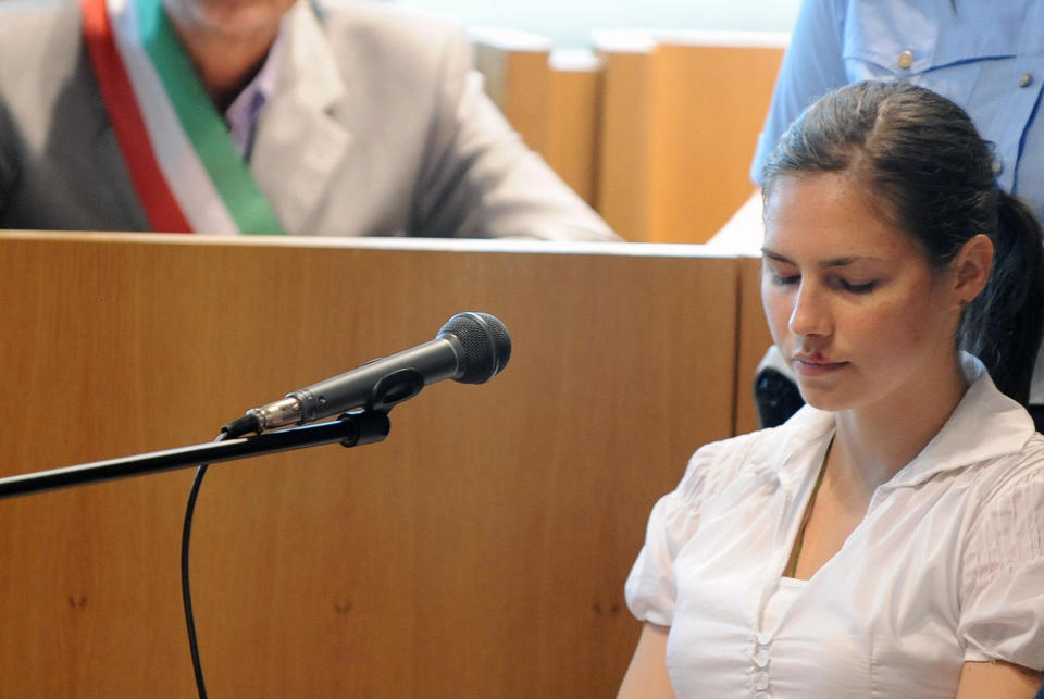 Knox <a href="http://www.huffingtonpost.com/huff-wires/20130326/eu-italy-knox-chronology/" target="_blank">takes the stand</a>, telling the court she was shocked by Kercher's death. She offers the alibi that she spent that night at her boyfriend's house and accuses police of beating her into making false statement.  <em>Amanda Knox, accused of killing her British housemate two-years ago, takes place in the courtroom on June 12, 2009 in Peruggia. (TIZIANA FABI/AFP/Getty Images)</em>