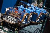 Body dummies are loaded into a new ride during operational testing as construction is underway in the amusement park district of Coney Island, Friday, June 17, 2022, in the Brooklyn borough of New York. Luna Park in Coney Island will open three new major attractions this season alongside new recreational areas and pedestrian plazas. (AP Photo/John Minchillo)