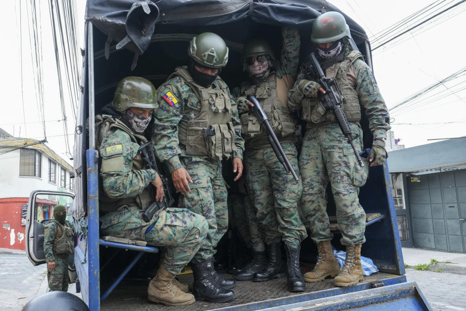 FILE - Soldiers patrol the perimeter of Inca prison during a state of emergency in Quito, Ecuador, Jan. 9, 2024, in the wake of the apparent escape of a powerful gang leader from prison. Seven people wearing military uniforms were killed on Feb. 28, 2024 in Ecuador's Amazon amid the decreed state of emergency that has increased police and military control aimed at lowering violence by criminal organizations linked to drug trafficking. (AP Photo/Dolores Ochoa, File)