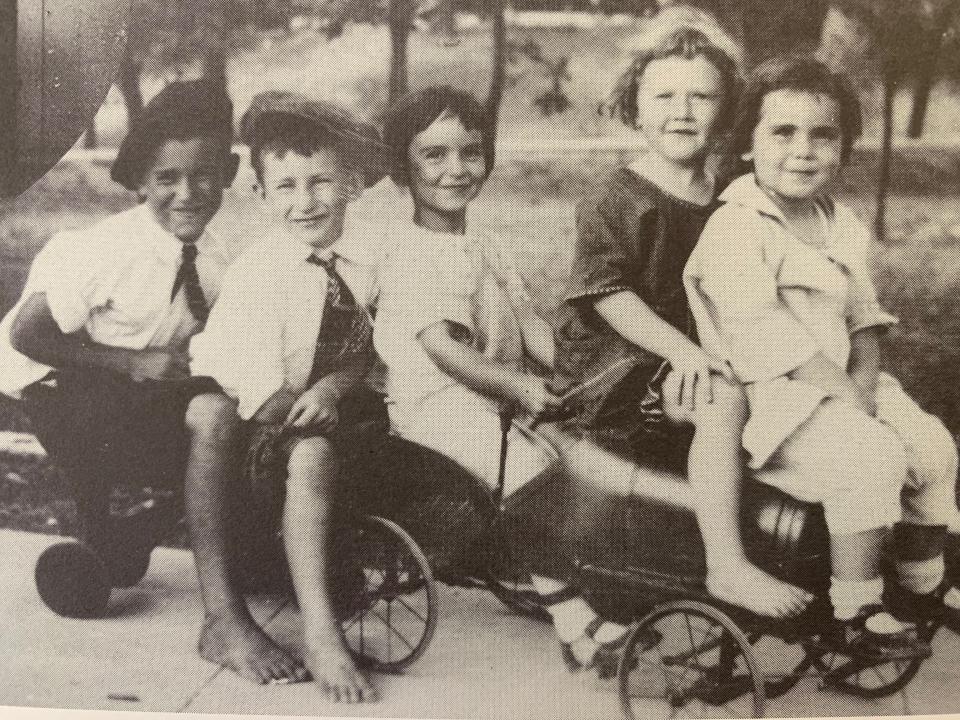 The Smoot children and neighbor kids made the most of the extensive, wild-seeming gardens at Flower Hill.