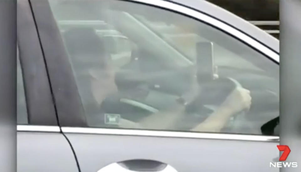 In March, a woman was filmed Facetiming on the Mitchell Freeway in Perth. Source: 7 News