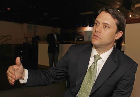 Georgia State Senator (D-Decatur), and gubernatorial candidate Jason Carter speaks to a member of the media after addressing supporters at a private event in Tucker, Georgia May 23, 2014. REUTERS/Tami Chappell