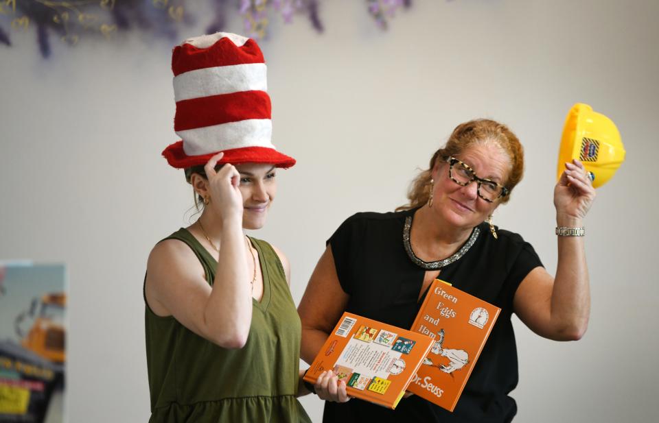 March is National Reading Month. To bring attention to the importance of reading, seven members of the community made a promotional video reading works by Dr. Seuss at the Early Learning Coalition of Brevard County in Melbourne. Left to right are Caitlin Rice, ELC's chair, and Laura Gambino, CEO.