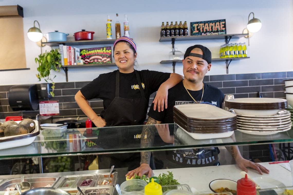 Chefs Val and Nando Chang at the counter of the original Itamae at the former St. Roch Market (now MIA Market), where they opened in 2018.