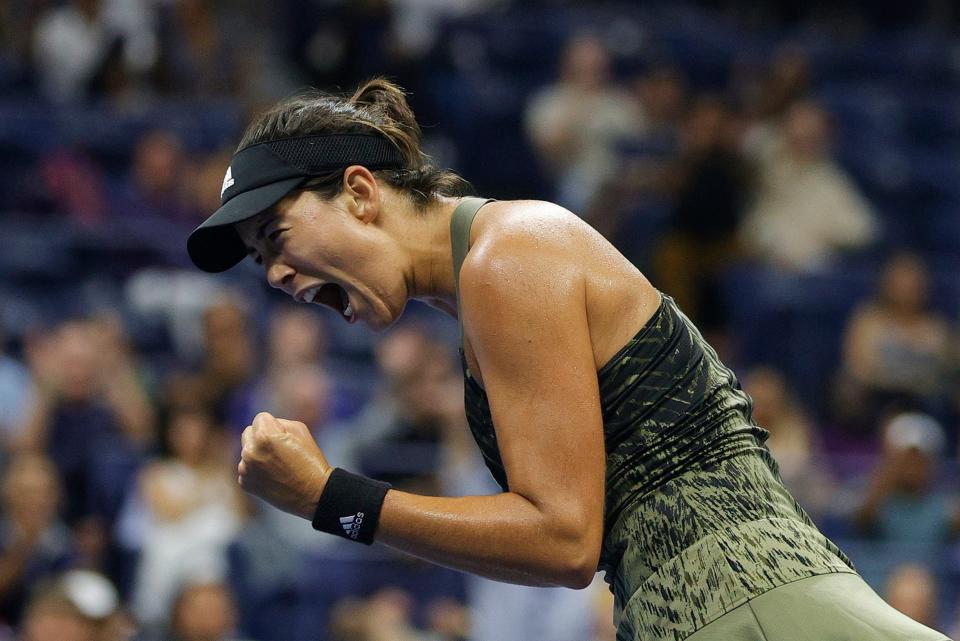 Spanish tennis star Garbine Muguruza celebrates winning a point during a US Open match.