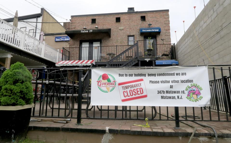 The West Front Street building that houses Italian Gourmet Delights, Salon 29, Regency Management Group and First Lenders Mortgage in Keyport was condemned due to an internal wall that collapsed because of adjacent construction. Work on the new building continues Tuesday, May 14, 2024.