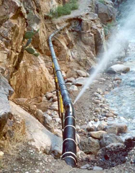 A gush of water spews out of a broken pipeline near Phantom Ranch. (NPS Photo)