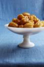 <p>Strike gold this holiday season with these honey glazed nibbles.</p><p><a href="https://www.womansday.com/food-recipes/food-drinks/recipes/a52677/fried-honey-bites/" rel="nofollow noopener" target="_blank" data-ylk="slk:Get the recipe.;elm:context_link;itc:0;sec:content-canvas" class="link "><em>Get the recipe.</em></a> </p>