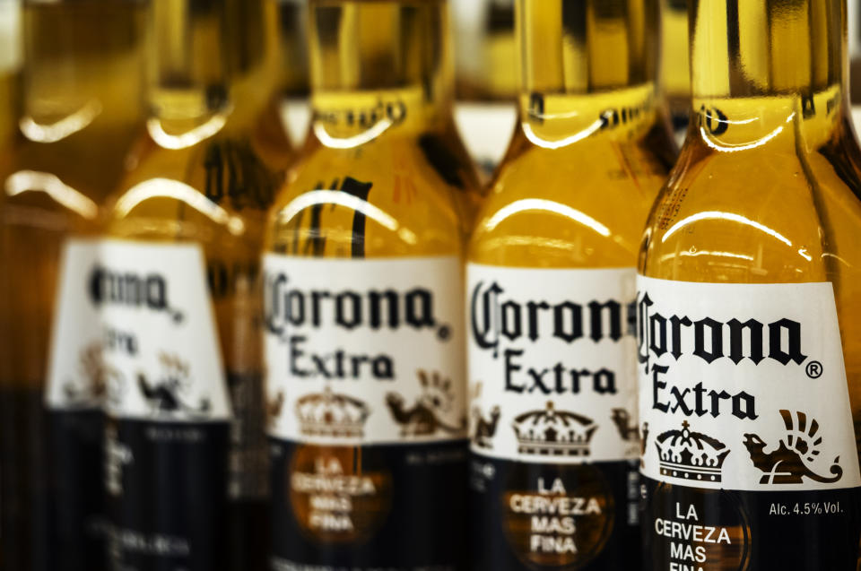 KIEV, UKRAINE - 2018/09/26: Detail of lined up Corona beer bottles seen on the store shelf. Corona extra Lager Beer is the flagship product of the Mexican company Grupo Modelo. (Photo by Igor Golovniov/SOPA Images/LightRocket via Getty Images)