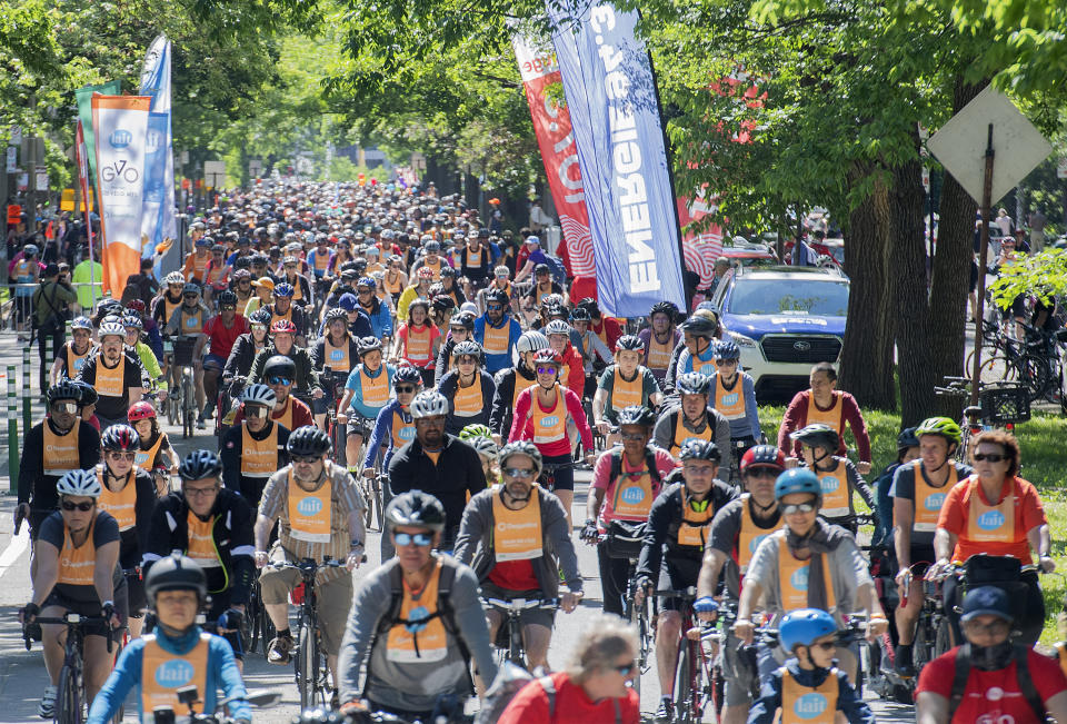 Cyclists set out on the Tour de l’ile, in Montreal, Sunday, June 5, 2022, the key event in the city’s weeklong bike festival. This year on June 4, Montrealers will line sidewalks and porches, toot horns and shout encouragement as swarms of cyclists wend their way through the iconic urban spaces of a bicycle-mad city. (Graham Hughes/The Canadian Press via AP)