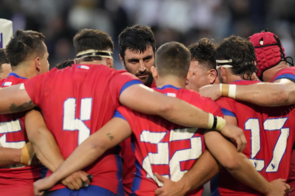 Chile's players huddle after the Rugby World Cup Pool D match between England and Chile at the Stade Pierre Mauroy in Villeneuve-d'Ascq, outside Lille, Saturday, Sept. 23, 2023. (AP Photo/Themba Hadebe)