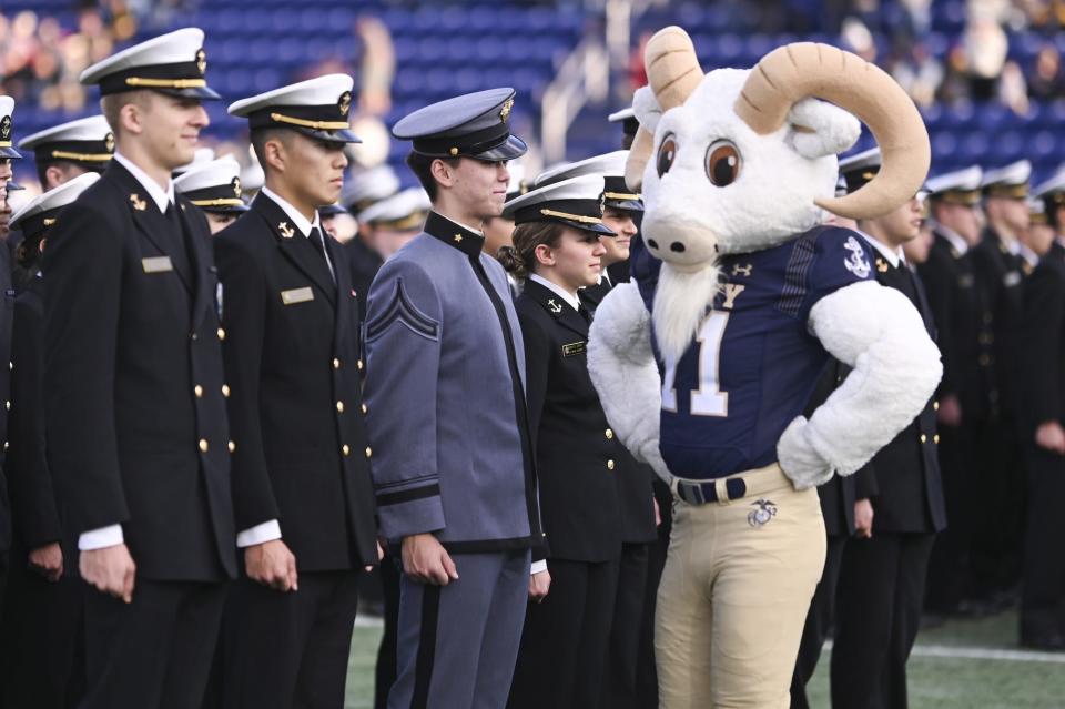 Nov 11, 2023; Annapolis, Maryland, USA; Navy Midshipmen mascot inspects a Army cadet while in formation prior to the start of the game against the UAB Blazers at Navy-Marine Corps Memorial Stadium. Mandatory Credit: Tommy Gilligan-USA TODAY Sports