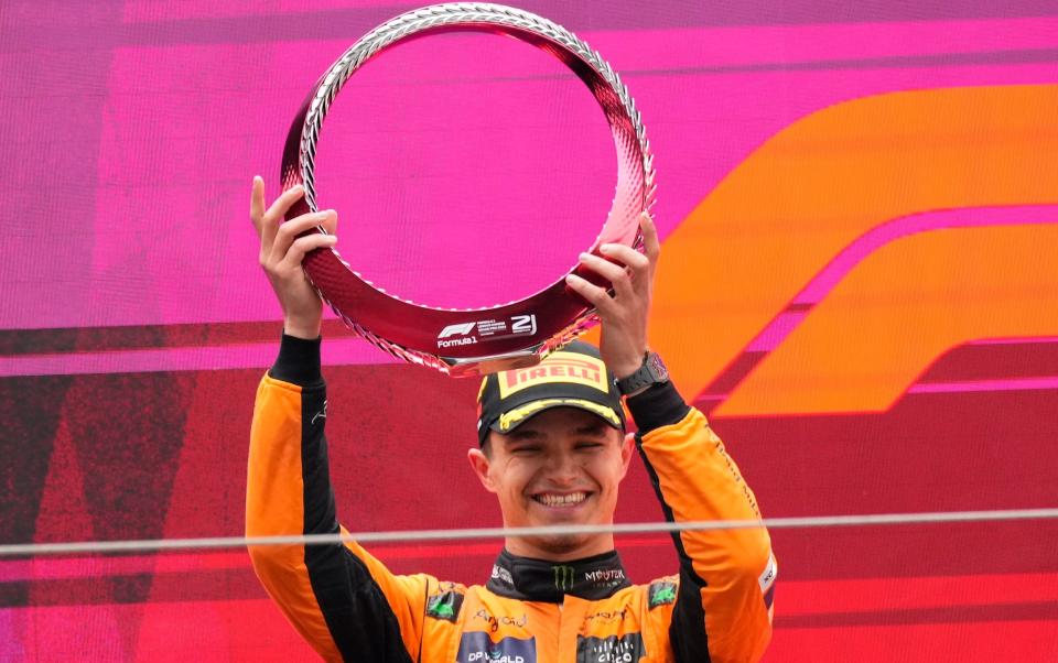 McLaren driver Lando Norris of Britain celebrates his second place at the Chinese Formula One Grand Prix at the Shanghai International Circuit, Shanghai, China, Sunday, April 21, 2024
