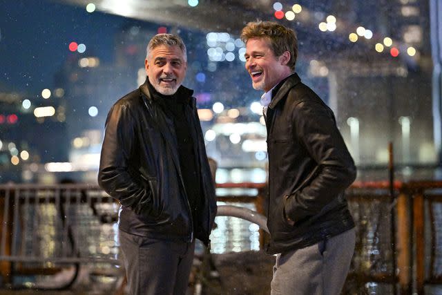 <p>James Devaney/GC Images</p> George Clooney and Brad Pitt filming <em>Wolves</em> in New York City on Feb. 14, 2023