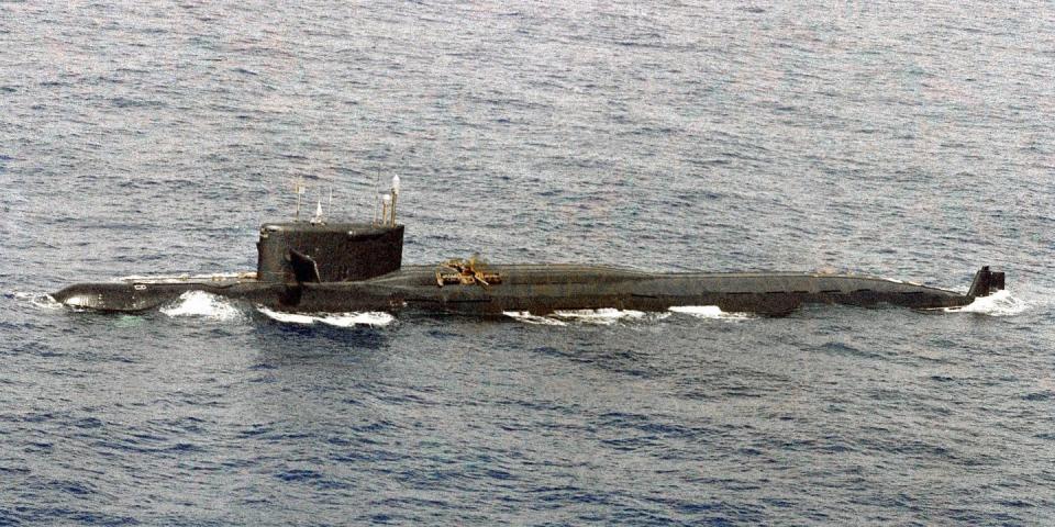 a port view of a soviet yankee class nuclear powered balistic missile submarine that was damaged by an internal liquid missile propellant explosion  three days later the ship sank in 18,000 feet of water