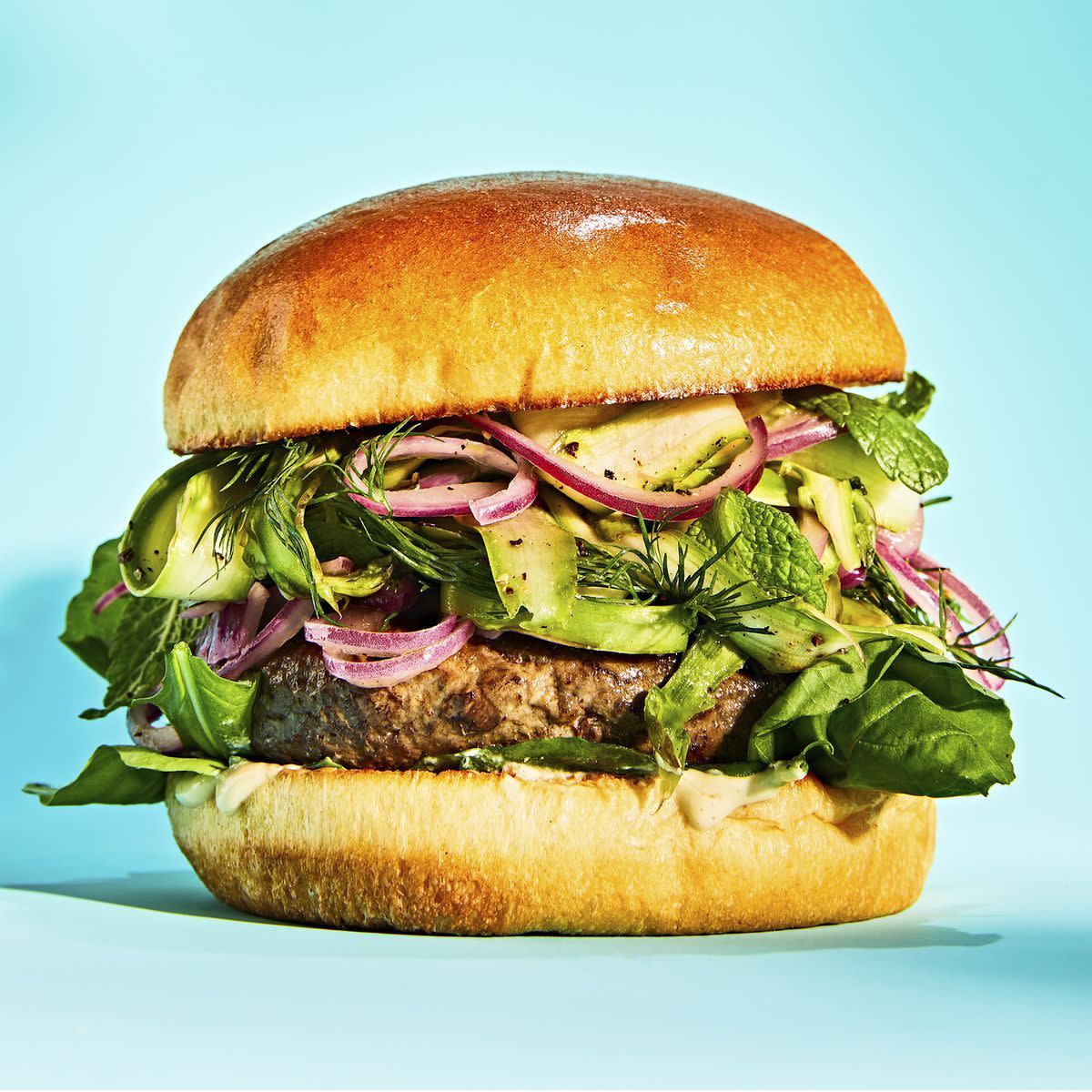 mushroom and beef blended burger recipe with shaved asparagus salad