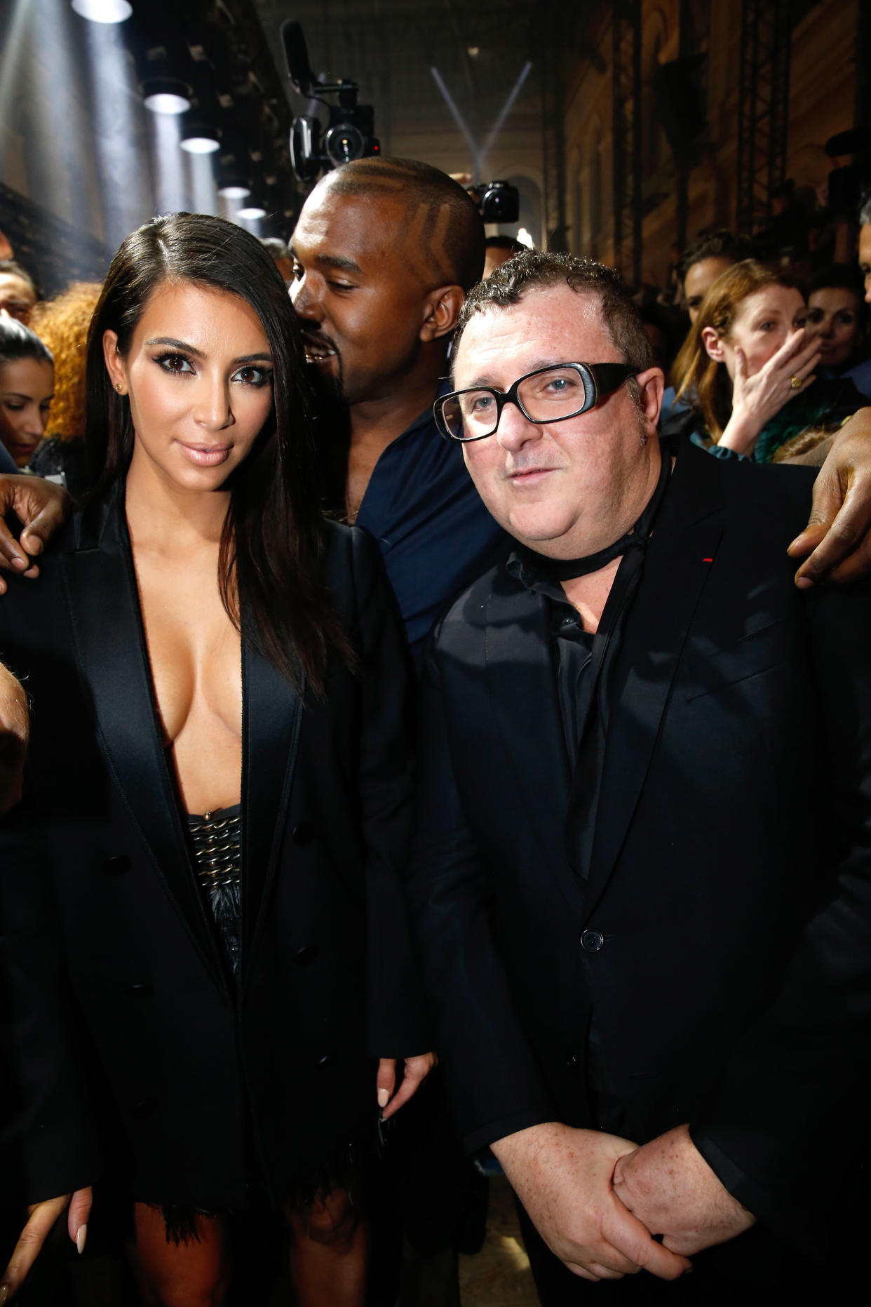 Kim Kardashian, Kanye West and Alber Elbaz depicted in Paris, France during a 2014 Lanvin fashion show. (Photo: Rindoff/Dufour/French Select/Getty Images)