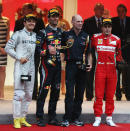 Race winner Mark Webber (2nd L) of Australia and Red Bull Racing celebrates on the podium with second placed Nico Rosberg (L) of Germany and Mercedes GP, third placed Fernando Alonso (R) of Spain and Ferrari and Red Bull Racing Chief Technical Officer Adrian Newey (2nd R) following the Monaco Formula One Grand Prix at the Circuit de Monaco on May 27, 2012 in Monte Carlo, Monaco. (Mark Thompson/Getty Images)