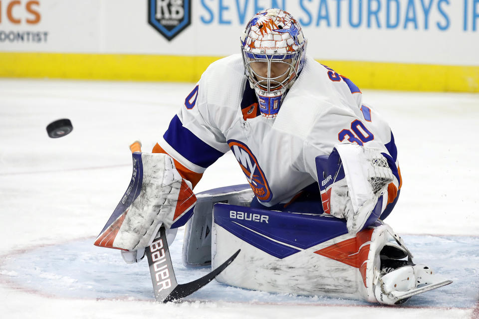 New York Islanders goaltender Ilya Sorokin blocks a shot by the Carolina Hurricanes during the second period of an NHL hockey game in Raleigh, N.C., Thursday, Oct. 14, 2021. (AP Photo/Karl B DeBlaker)