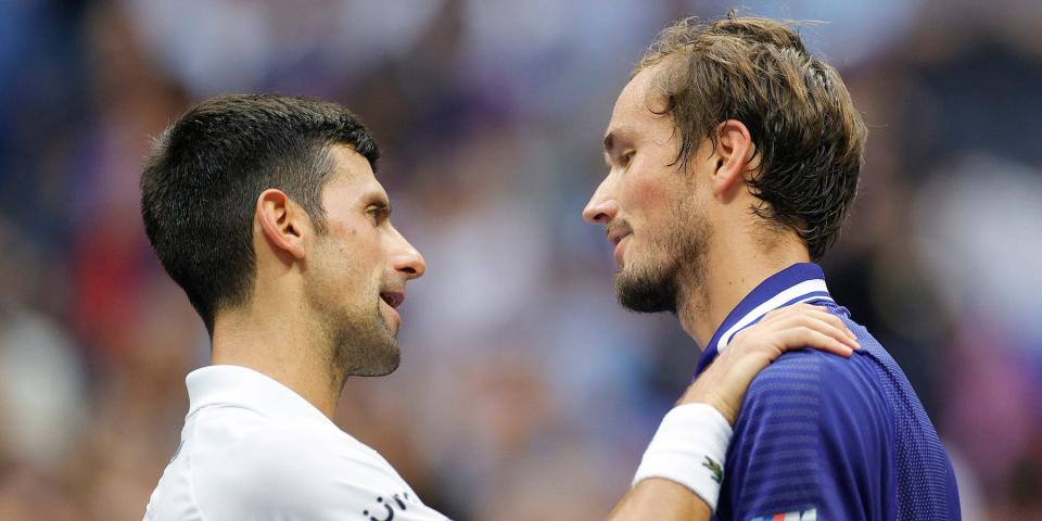 Daniil Medvedev (R) of Russia and Novak Djokovic (L) of Serbia talk at center court after Medvedev won their Men's Singles final match on Day Fourteen of the 2021 US Open at the USTA Billie Jean King National Tennis Center on September 12, 2021 in the Flushing neighborhood of the Queens borough of New York City.