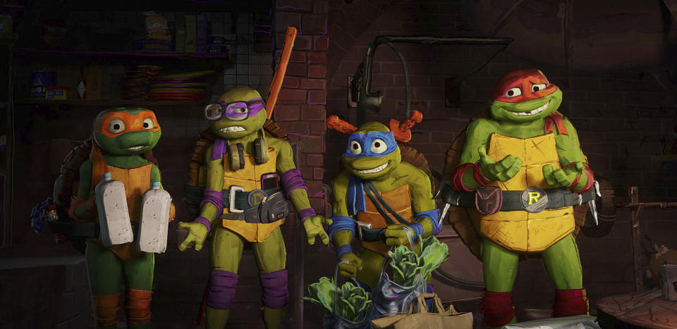 This image released by Paramount Pictures shows, from left, Michelangelo "Mikey", voiced by Shamon Brown Jr., Donatello, "Donnie" voiced by Micah Abbey, Leonardo "Leo", voiced by Nicolas Cantu and Raphael "Raph", voiced by Brady Noon in a scene from "Teenage Mutant Ninja Turtles: Mutant Mayhem." (Paramount Pictures via AP)