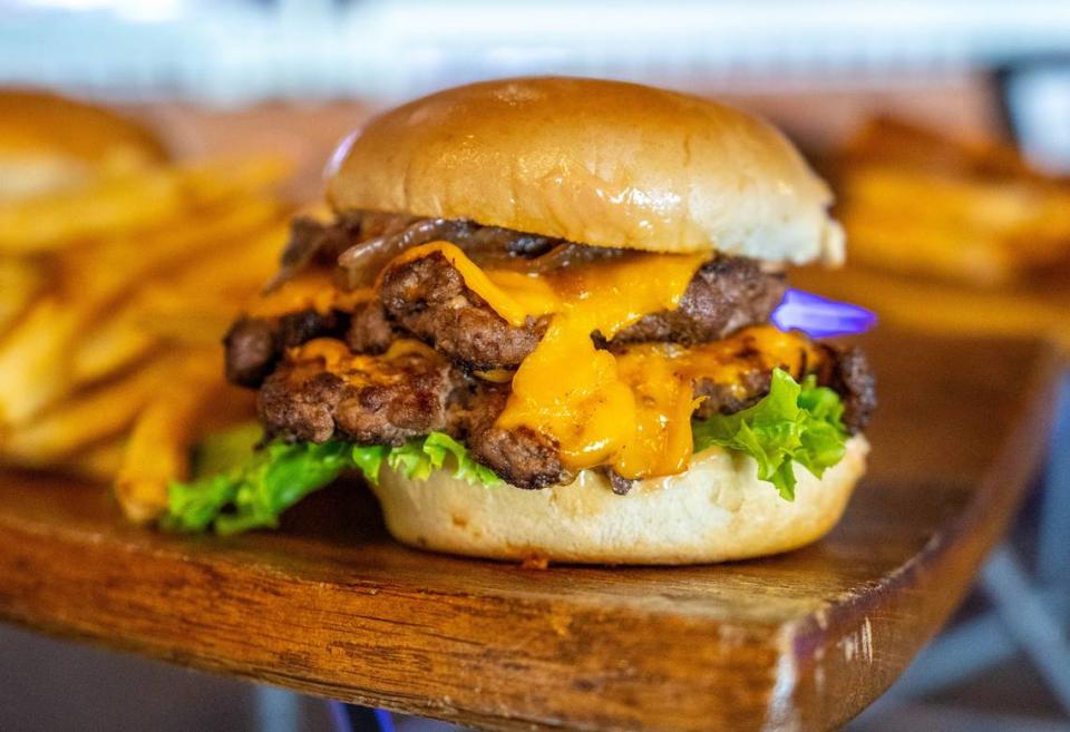 Cafe Bernardo’s double smash burger is a new menu item for the Sacramento Kings 2023-24 season. The burger is showcased during the Golden 1 Center’s media food tasting event on Monday.