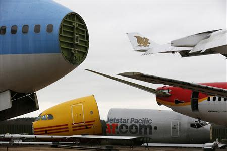 Dismantled planes are seen in the recycling yard of Air Salvage International (ASI) in Kemble, central England November 27, 2013. REUTERS/Stefan Wermuth