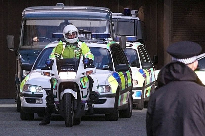 A police convoy escorts a van carrying Moors Murderer Ian Brady away from Liverpool Crown Court, where he made his first court appearance in more than 30 years,  Monday February 28, 2000. The child-killer is demanding the right to die and will be giving evidence at a four-day judicial review in chambers at Liverpool Crown Court in front of Mr Justice Kay.  It was Brady's first appearance in court since May 1966, when he was convicted along with his lover Myra Hindley of murdering 10-year-old Lesley Ann Downey and 17-year-old Edward Evans.  See PA story COURTS Brady.  PA photo: Phil Noble.