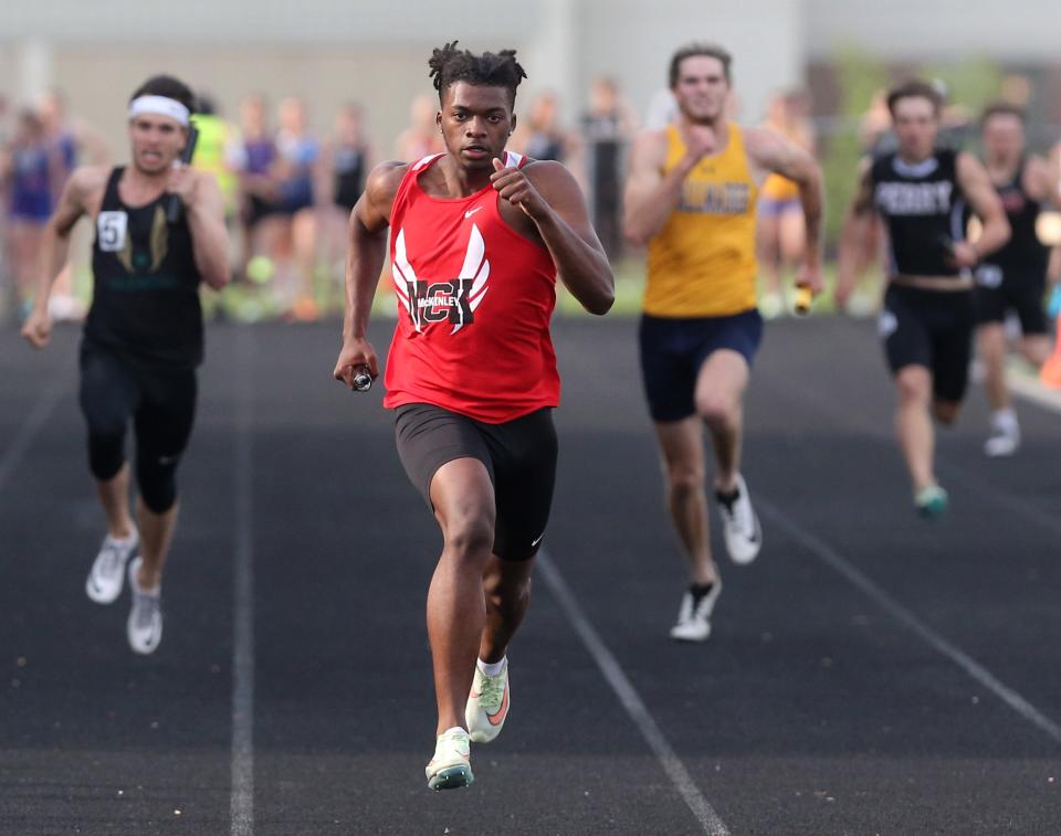 Caleb Ruffin of McKinley anchored their 4x200 meter relay team the took first place during the DI district track and field meet at Hoover on Friday, May 20, 2022.