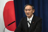 Japan's new Prime Minister Yoshihide Suga speaks during a press conference at the prime minister's official residence Wednesday, Sept. 16, 2020 in Tokyo, Japan. Japan's Parliament elected Suga as prime minister Wednesday, replacing long-serving leader Shinzo Abe with his right-hand man.(Carl Court/Pool Photo via AP)