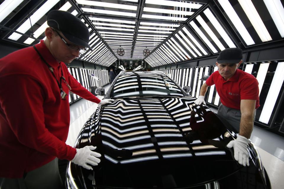 Workers at Nissan's plant in Sunderland on the production line for the Infiniti Q30 &quot;active compact&quot; vehicle, the first major new brand of car to be manufactured in Britain for 23 years.