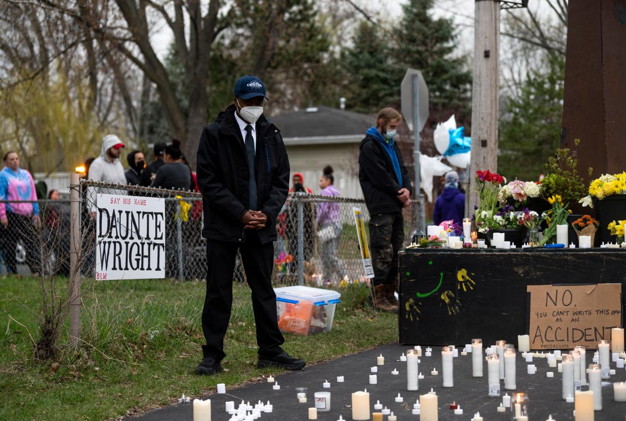 <p>Brooklyn Center Mayor Mike Elliott visits a memorial site for Daunte Wright on April 14, 2021</p> ((Photo by Stephen Maturen/Getty Images))