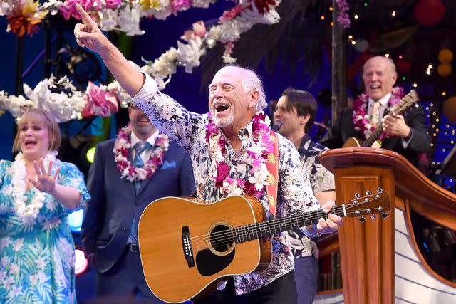 <p>Noam Galai/Getty</p> Jimmy Buffett (C) takes opening night bow during the Broadway premiere of "Escape to Margaritaville" in 2018