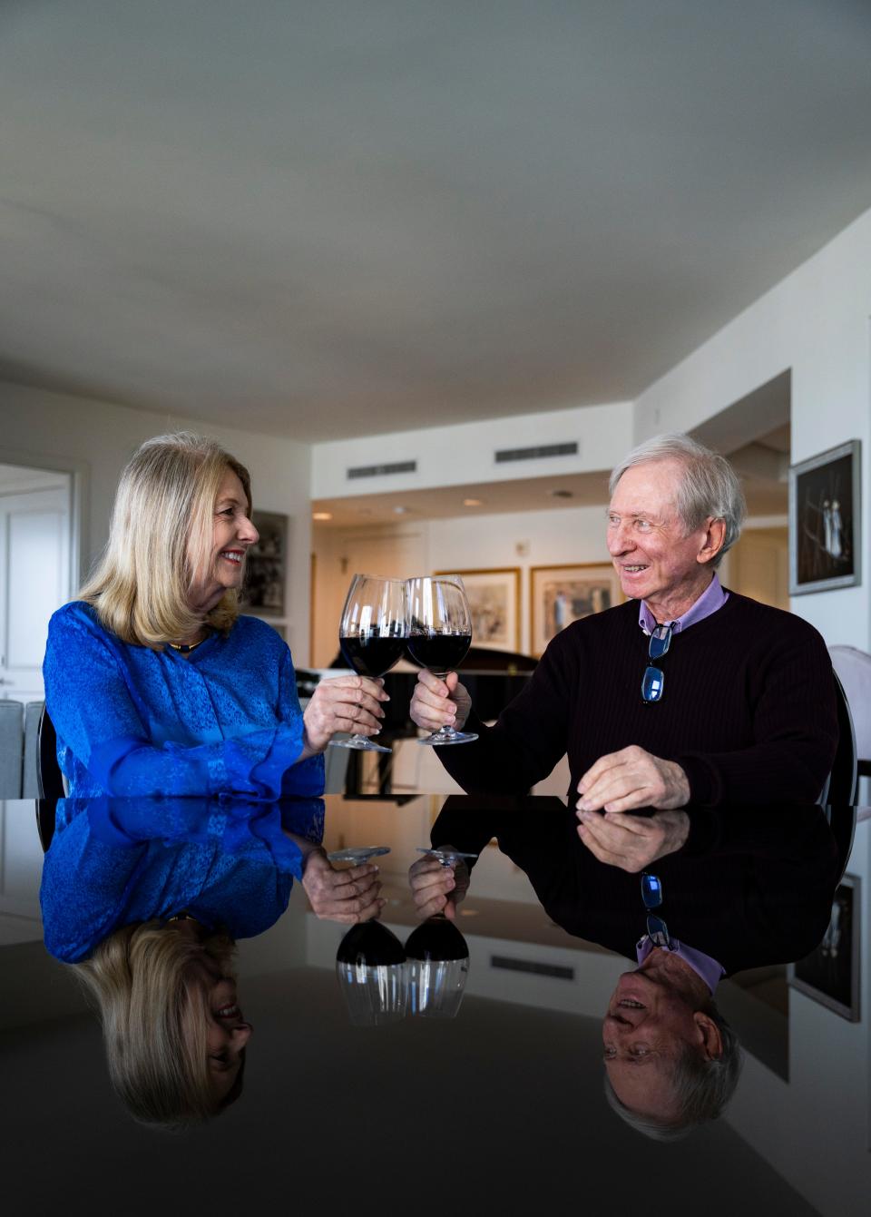 Denise and Brian Cobb pose for a photo at their home in Naples on Thursday, Dec. 21, 2023.