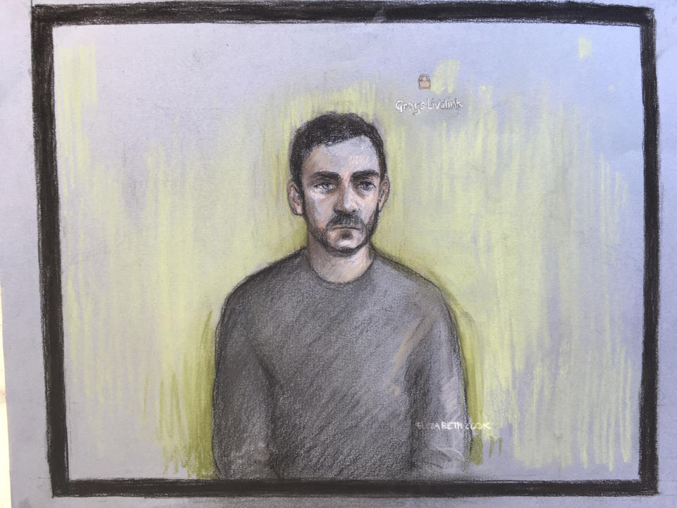 Court artist sketch by Elizabeth Cook shows lorry driver Maurice Robinson, 25, on a video-link at Chelmsford Magistrates' Court, England, Monday Oct. 28, 2019. Authorities found 39 people dead in a truck in an industrial park in England on Wednesday and arrested the driver on suspicion of murder in one of Britain's worst human-smuggling tragedies. (Elizabeth Cook/PA via AP)