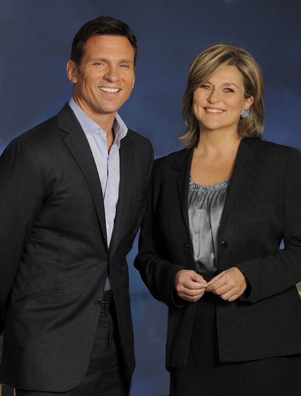 This May 2013 publicity image released by ABC shows Bill weir, left, and Cynthia McFadden, of the news magazine show "The Lookout," in New York. "The Lookout" emphasizes consumer issues with a mix of investigative and trend stories, striving for a hip look that breaks down walls with viewers. (AP Photo/ABC, Donna Svennevik)