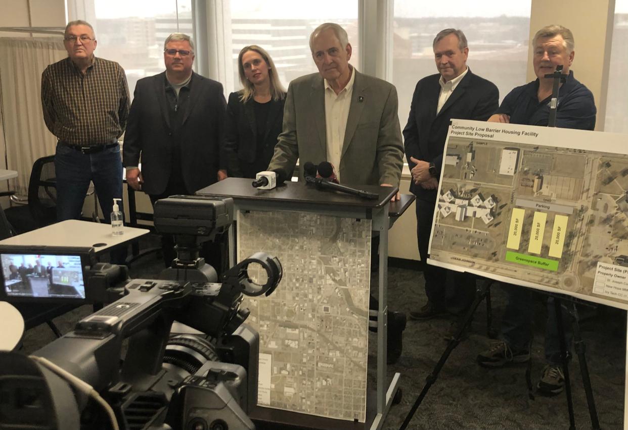 St. Joseph County Commissioner Carl Baxmeyer starts a press conference Wednesday, Feb. 7, 2024, in the County-City Building on a task force seeking alternative sites for a low-barrier homeless intake center. Next to him is the map of a site the county has offered. From left, is county Commissioner Tony Hazen, county council members Joe Thomas and Amy Drake, businessman Kevin Smith and Commissioner Derek Dieter.