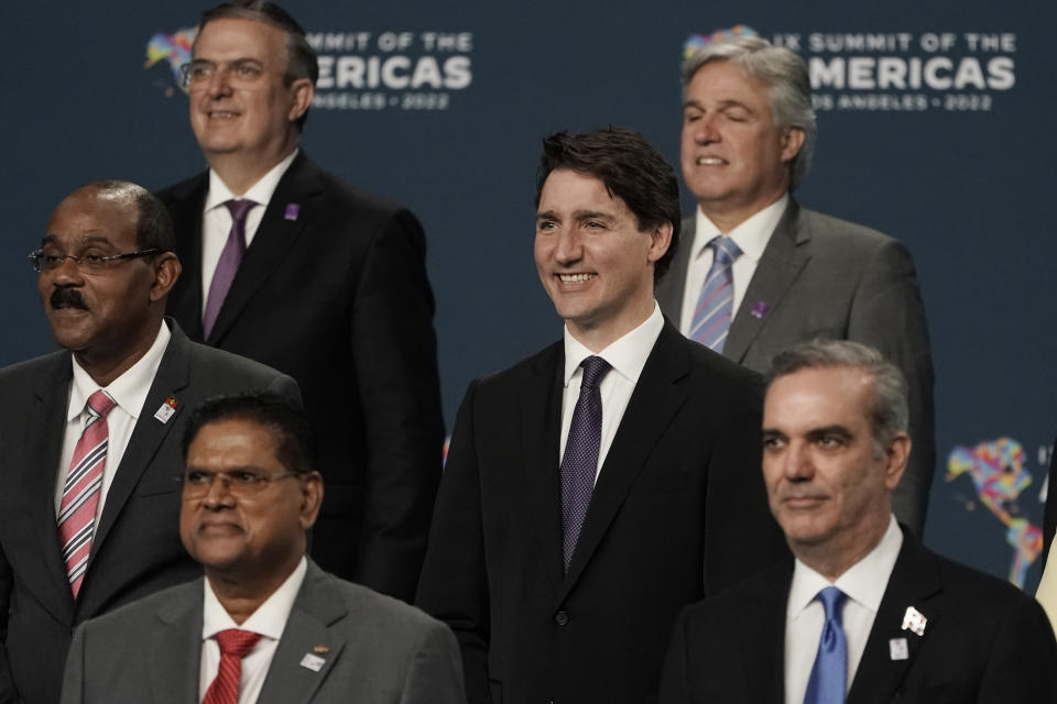 Canadian Prime Minister Justin Trudeau poses as he participates in a family photo with heads of delegations at the Summit of the Americas, Friday, June 10, 2022, in Los Angeles. (AP Photo/Jae C. Hong)