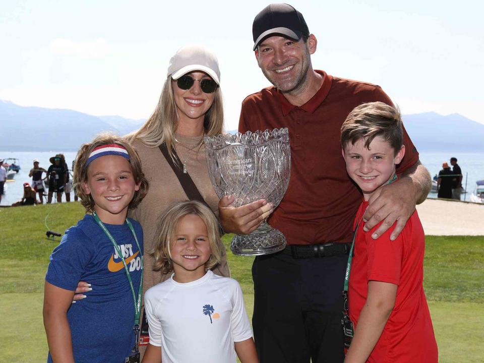 <p>Isaiah Vazquez/Clarkson Creative/Getty</p> Tony Romo and Candace Romo with their kids, Hawkins, Rivers, and Jones, at the American Century Championship in 2022 