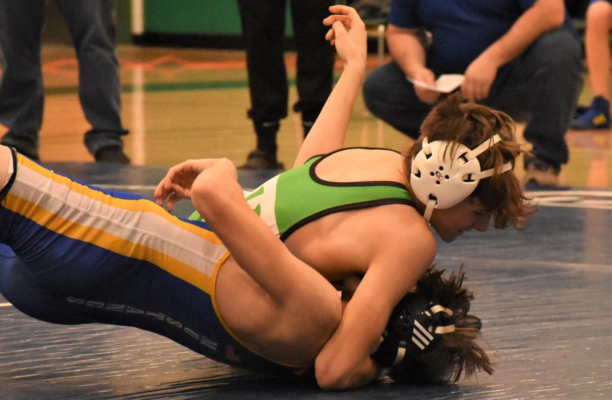 Herkimer Magician Braysen Richard pursues a pin against Mt. Markham Mustang Dameon Case at 152 pounds Tuesday. Richard is wrestling at Herkimer for the first time after competing for the Little Falls Mounties last winter.