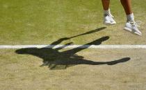 Garbine Muguruza of Spain serves during her match against Agnieszka Radwanska of Poland at the Wimbledon Tennis Championships in London, July 9, 2015. REUTERS/Glyn Kirk/Pool