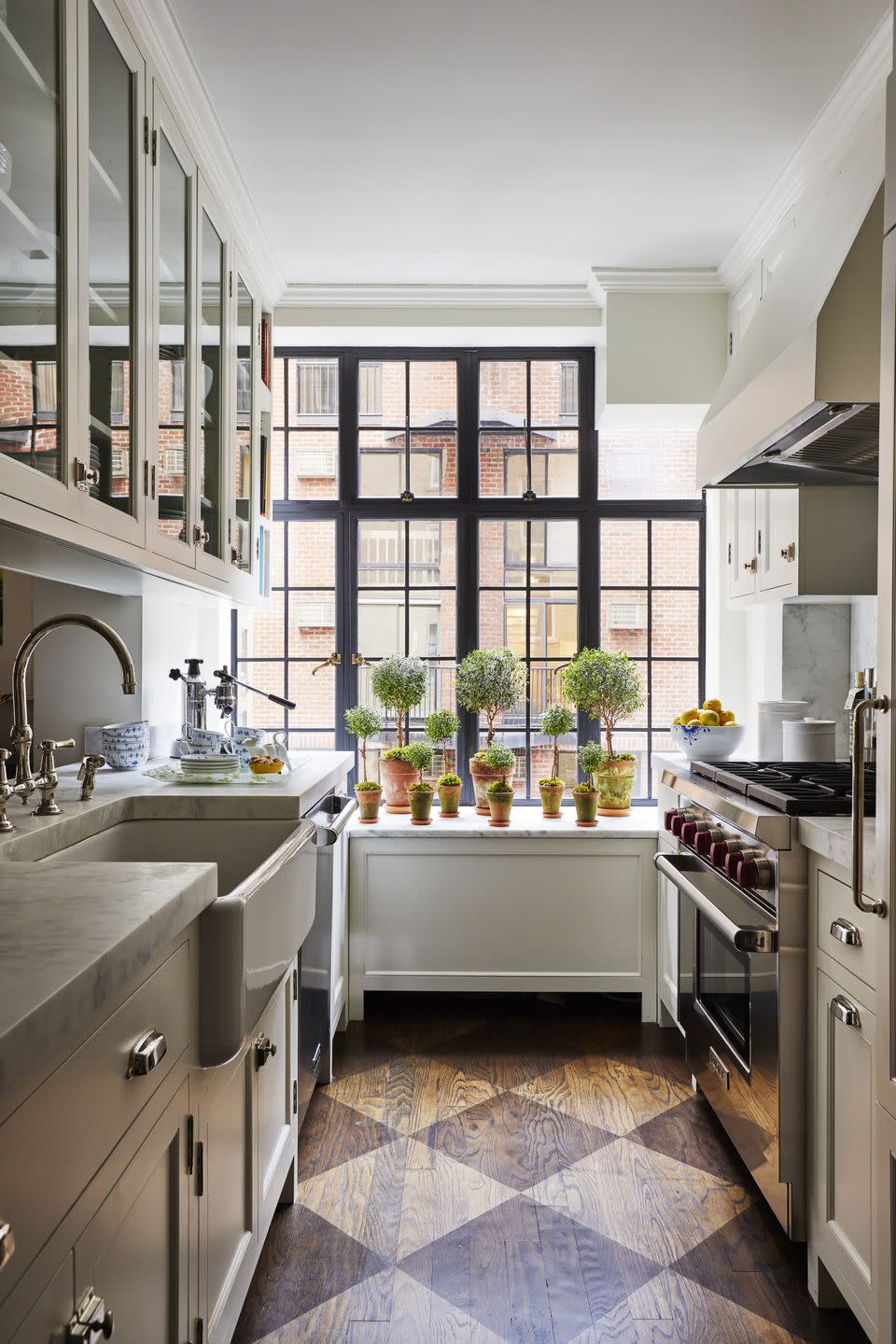 large steel casement windows in a galley kitchen