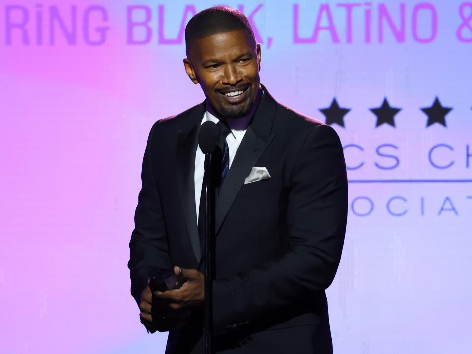 Jamie Foxx accepts the Vanguard Award onstage during the Critics Choice Association's "Celebration" event in Los Angeles, California on December 4, 2023.