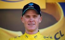 Cycling - Tour de France cycling race - The 184-km (114,5 miles) Stage 8 from Pau to Bagneres-de-Luchon, France - 09/07/2016 - Team Sky rider Chris Froome, new yellow jersey leader, reacts on the podium after winning the stage. REUTERS/Juan Medina