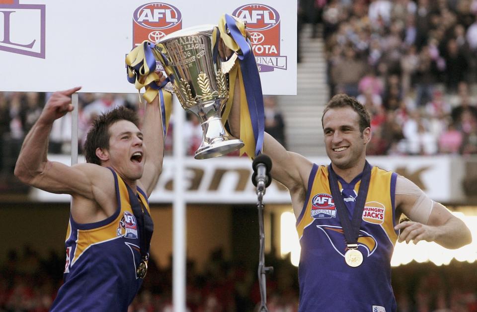 Pictured left to right, West Coast icons Ben Cousins and Chris Judd celebrate after winning the 2006 AFL premiership. 
