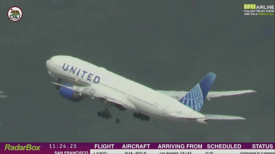 In this image taken from video provided by Cali Planes, a United Airlines Boeing 777 bound for Japan loses a tire as it takes off from San Francisco International Airport, Thursday, March 7, 2024. The plane made a safe emergency landing in Los Angeles. (Cali Planes via AP)