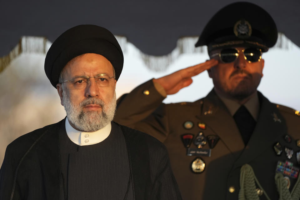 Iranian President Ebrahim Raisi reviews an honor guard during his official departure ceremony as he leaves Tehran's Mehrabad airport to New York to attend annual UN General Assembly meeting, Monday, Sept. 19, 2022. Raisi headed to New York on Monday, where he will be speaking to the U.N. General Assembly later this week, saying that he has no plans to meet with President Joe Biden on the sidelines of the U.N. event. (AP Photo/Vahid Salemi)