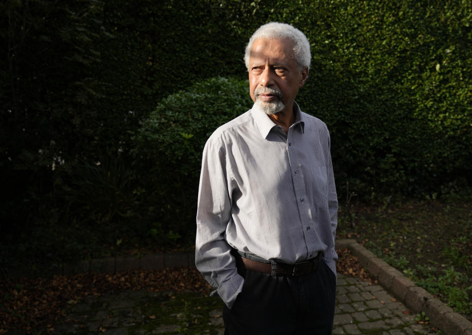 Tanzanian writer Abdulrazak Gurnah poses for a photo at his home in Canterbury, England, Thursday, Oct. 7, 2021. Gurnah was awarded the Nobel Prize for Literature earlier on Thursday. The Swedish Academy said the award was in recognition of his "uncompromising and compassionate penetration of the effects of colonialism." (AP Photo/Frank Augstein)