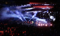 Rapper Meek Mill performs ahead of the first half of an NBA All-Star basketball game, Sunday, Feb. 17, 2019, in Charlotte, N.C. (AP Photo/Gerry Broome)